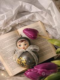 Candela Bambola Oscillante