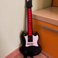 Chitarra giocattolo “Gibson” diavoletto com musica