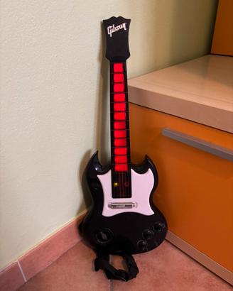 Chitarra giocattolo “Gibson” diavoletto com musica