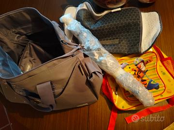 borsa per il cambio, ombrellino, zainetto.