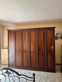 camera da letto in legno stile arte povera 