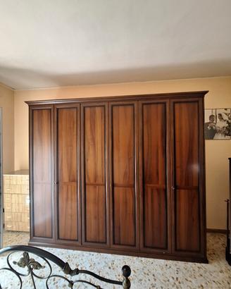 camera da letto in legno stile arte povera 