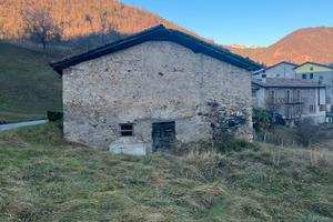 Rustico e terreno edificabile