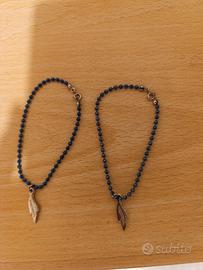 Braccialetti con perline e ciondolo