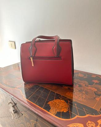 Borsa bordeaux in ecopelle a mano