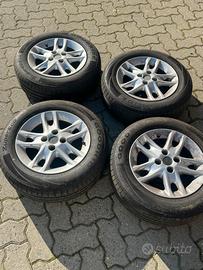 4 cerchi con gomme estive 185/65R14