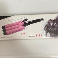 Piastra per capelli a tre rami