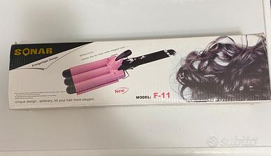 Piastra per capelli a tre rami