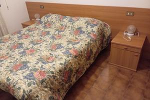 Camera con balcone giardino