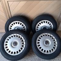 Cerchi con copricerchi + Barre portabagagli