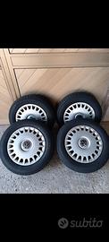 Cerchi con copricerchi + Barre portabagagli