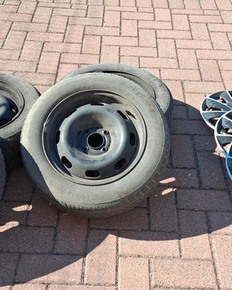 4 cerchi in ferro 15'' (4x108) +  7 copricerchi