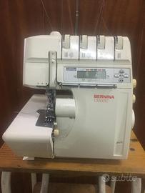 MACCHINA DA CUCIRE  TAGLIA E CUCI BERNINA 1300DC