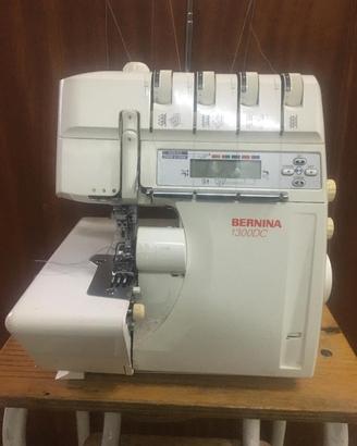 MACCHINA DA CUCIRE  TAGLIA E CUCI BERNINA 1300DC