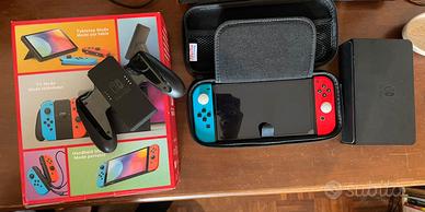 Switch Oled + giochi + custodia
