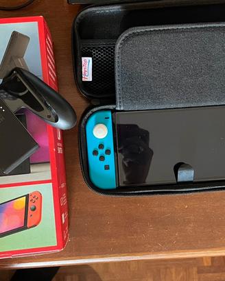 Switch Oled + giochi + custodia