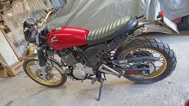 Honda dominator 650-vespa 150