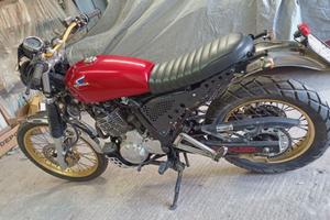 Honda dominator 650-vespa 150