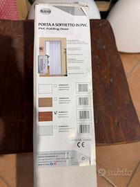 Porta a soffietto in PVC con profili rovere