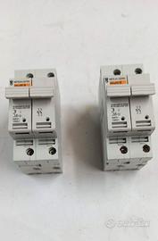 Due Portafusibili MERLIN GERIN multi 9 STI 10,3x38