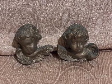 Coppia teste di angeli in legno da parete