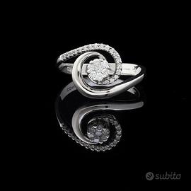 ANELLO COMETE CONTRARIE ORO 18KT  BRILLANTI 0.21CT