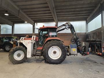 New holland G210 con braccio taglia erba