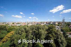 AMPIO APPARTAMENTO CON TERRAZZO PANORAMICO E BOX A