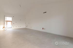 Attico di nuova costruzione con posto auto