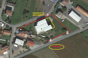 Immobile Commerciale con 2 alloggi con terreno edi