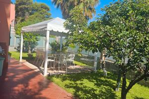 Appartamento in villa con giardino e piscina cond