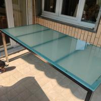 tavolo in vetro e acciaio