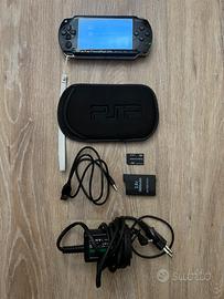 Sony PSP con accessori e giochi