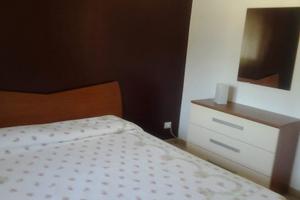 Bilocale in resort con piscina