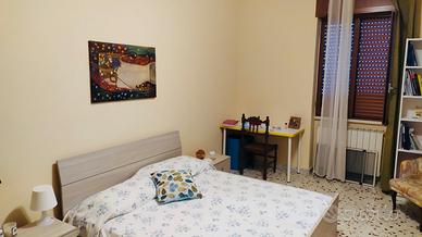 Stanza con bagno in camera