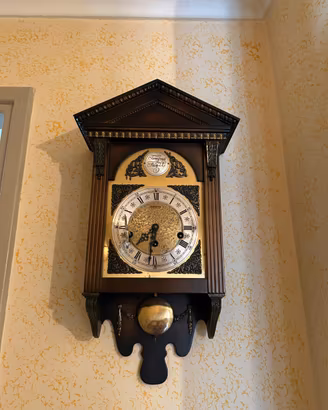 Orologio a pendolo da parete