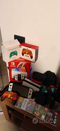 Nintendo Switch OLED con accessori e giochi 
