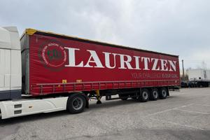 Semirimorchio centinato Schmitz alza abbassa