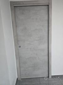 Porta interna scorrevole effetto cemento  80x210