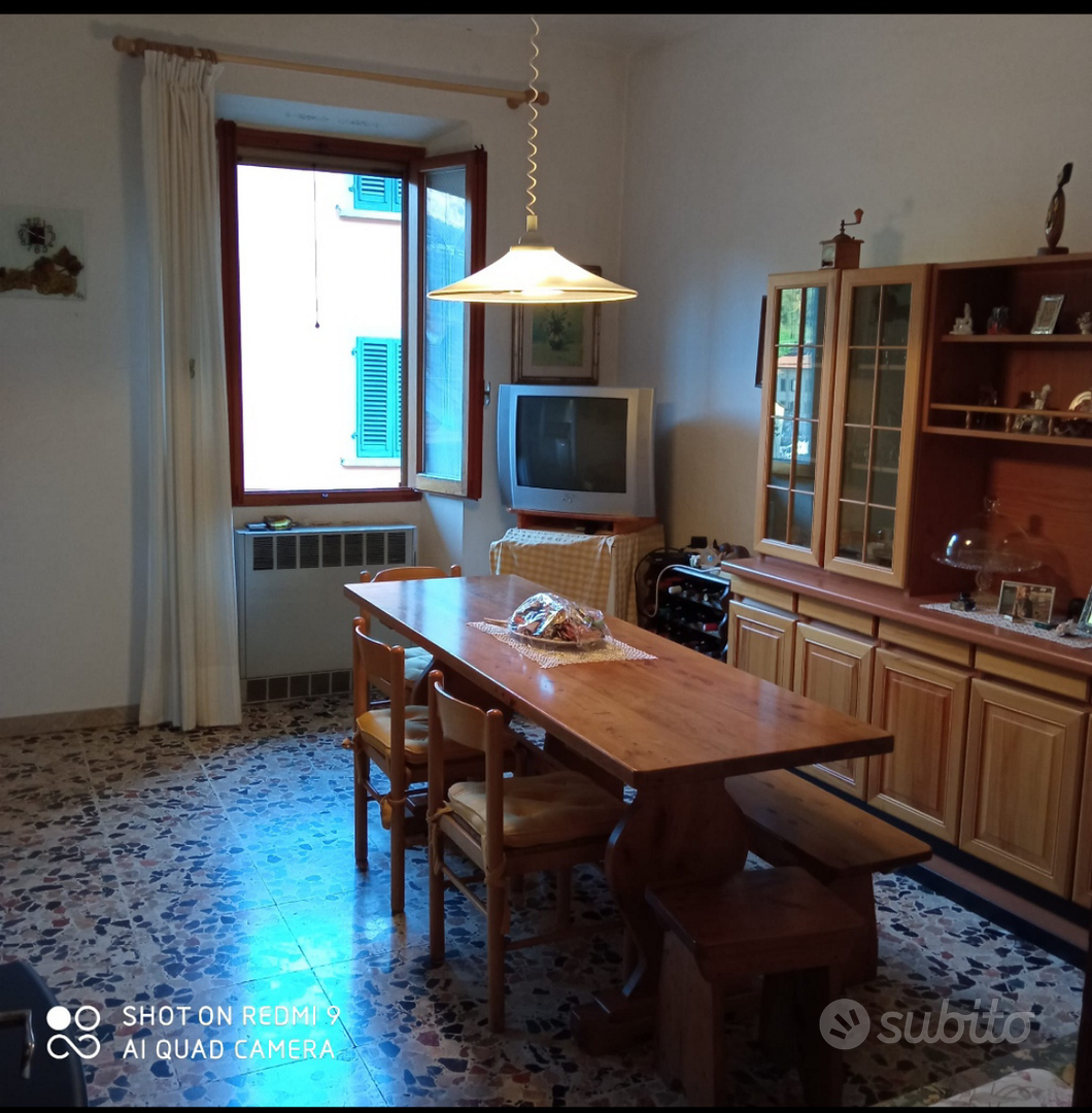Ampio appartamento con taverna e terreno