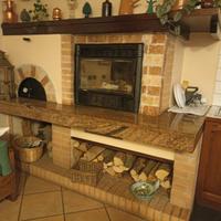 opera in muratura Camino chiuso e forno .