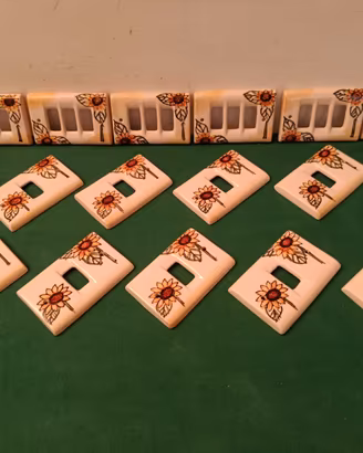 PLACCHE PER INTERRUTTORI IN CERAMICA ARTIGIANALI