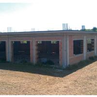 Fabbricato commerciale + terreno edificabile