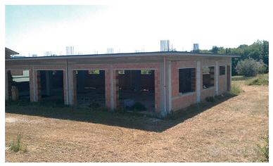 Fabbricato commerciale + terreno edificabile