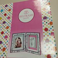 cornice foto argento con calco in gesso bambina 