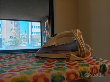 asse con ferro da stiro