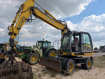 New Holland w 169 escavatore gommato
