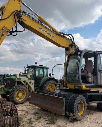 New Holland w 169 escavatore gommato