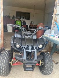 quad 125