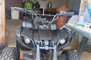 quad 125